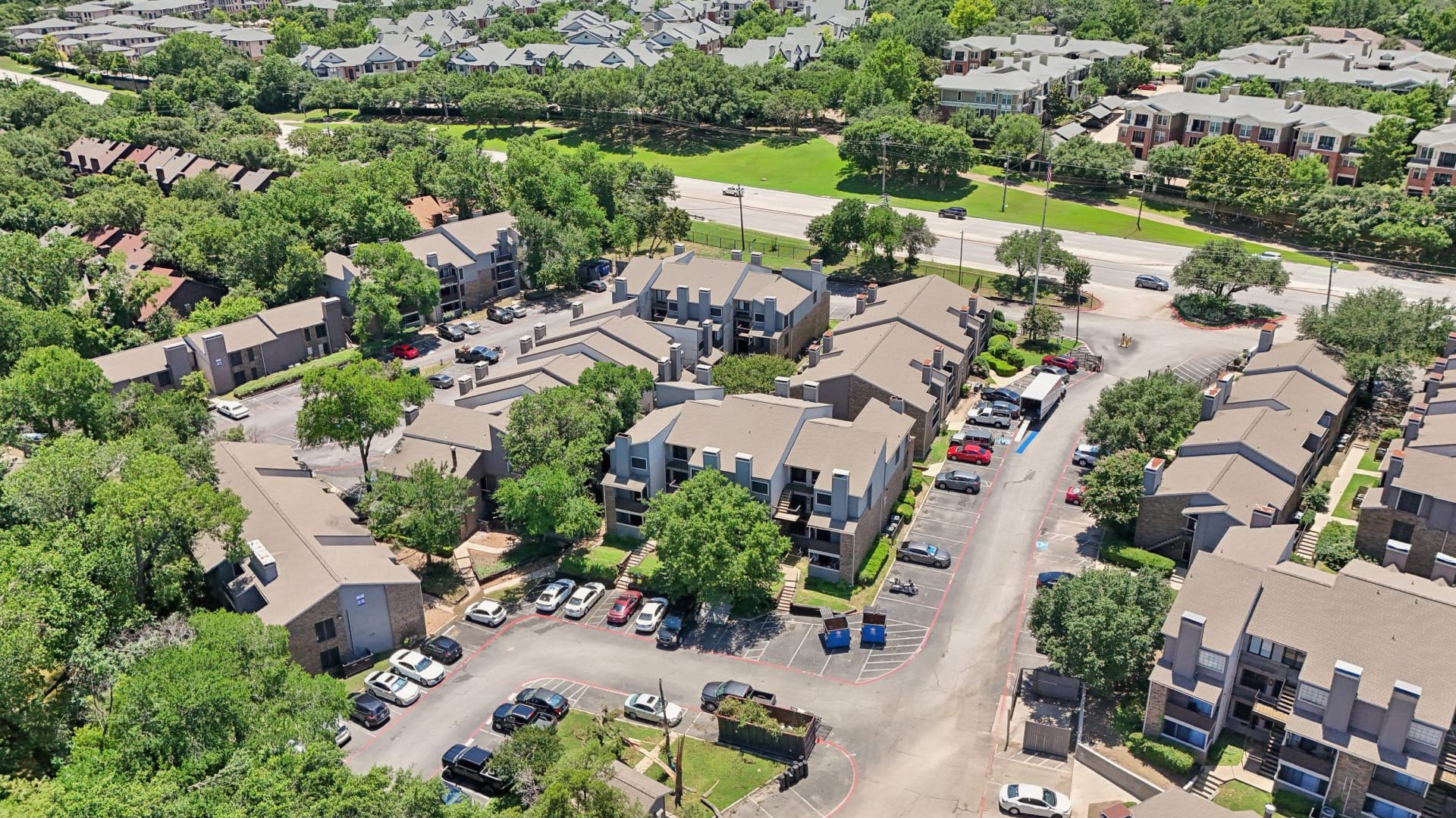 an aerial view of the apartment complex in houston at The Cross Creek Apartments